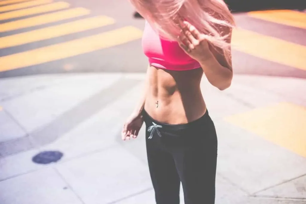 Woman with toned stomach after LA-EMS Body Sculpting Treatment Hatfield